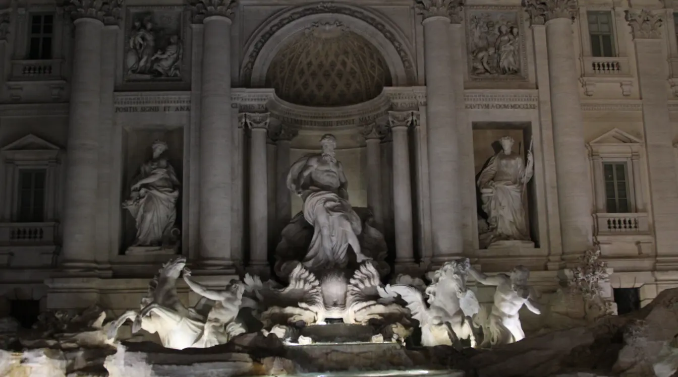 Trevi Fountain illuminated at night in Rome