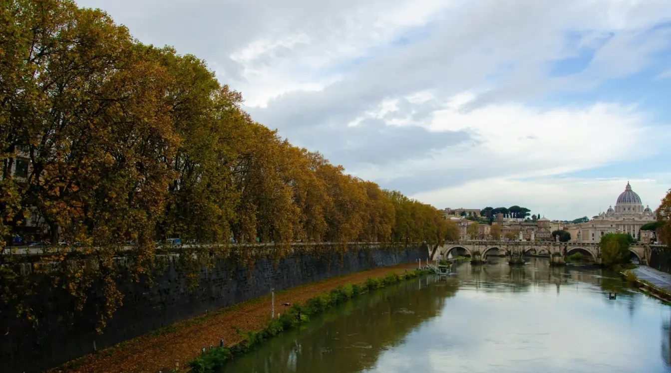 Tiber River and Castel Sant’Angelo in Rome with autumn foliage